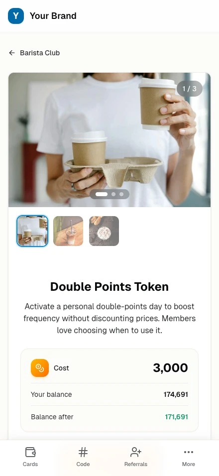 The same customer wallet on a phone, with points and active cards