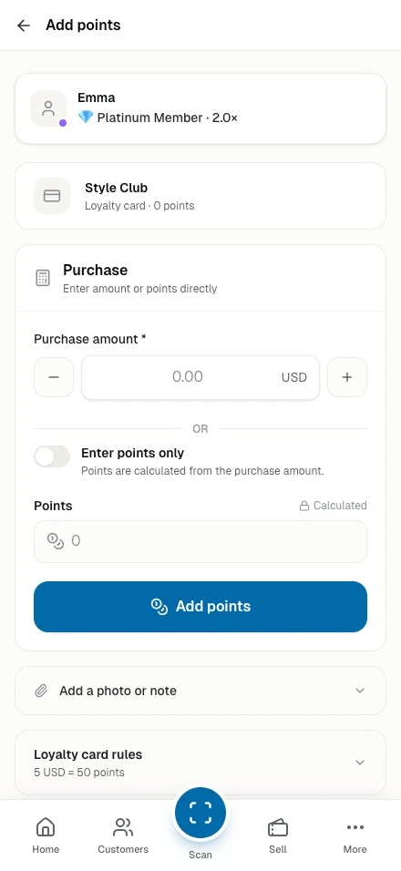 Staff phone adding points to a loyalty card after a customer purchase
