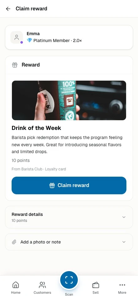 Staff phone claiming a reward for a customer, with the reward and its points cost