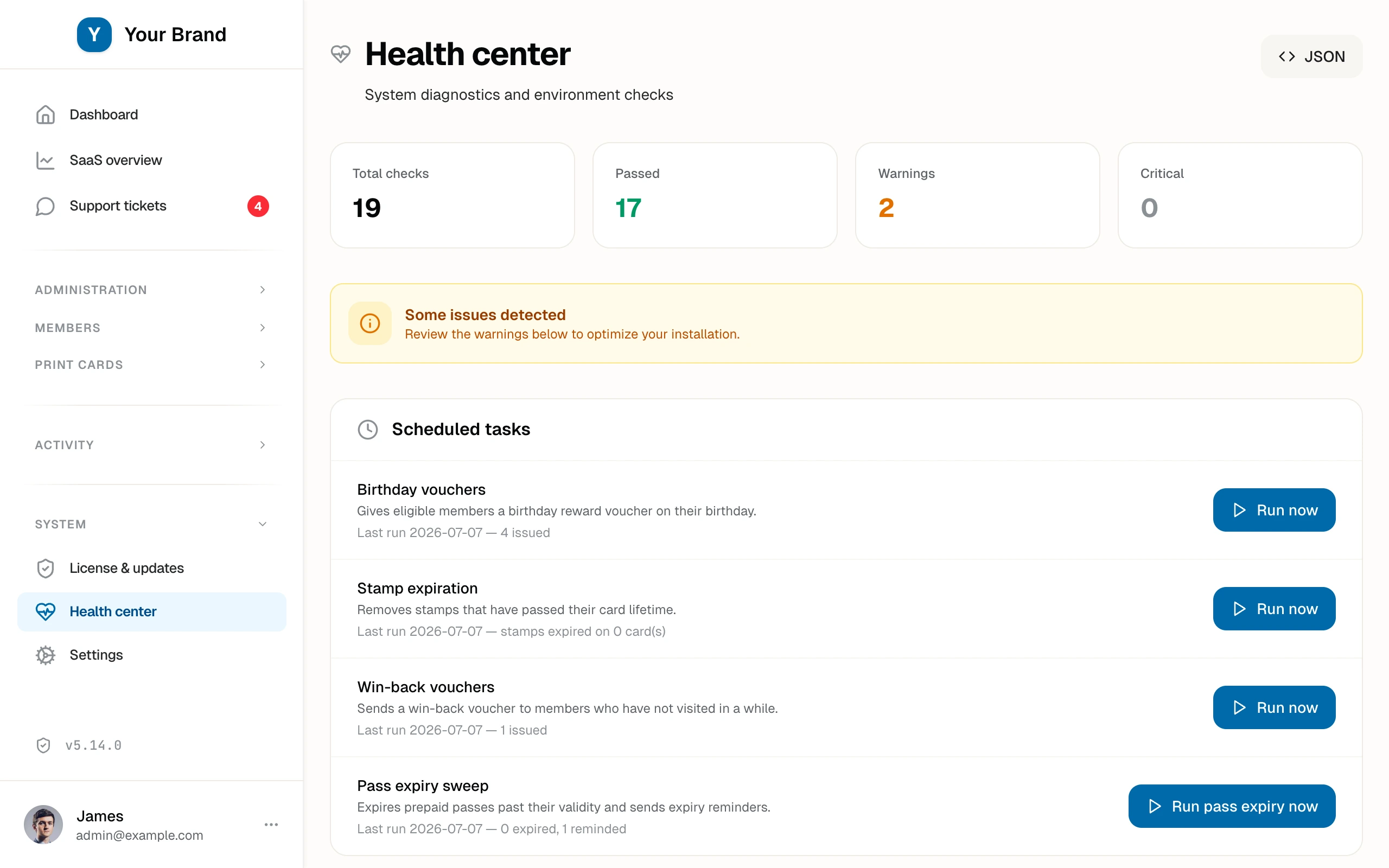 The health center with the environment checks and the scheduled tasks panel, each task with its last run result and a Run now button.