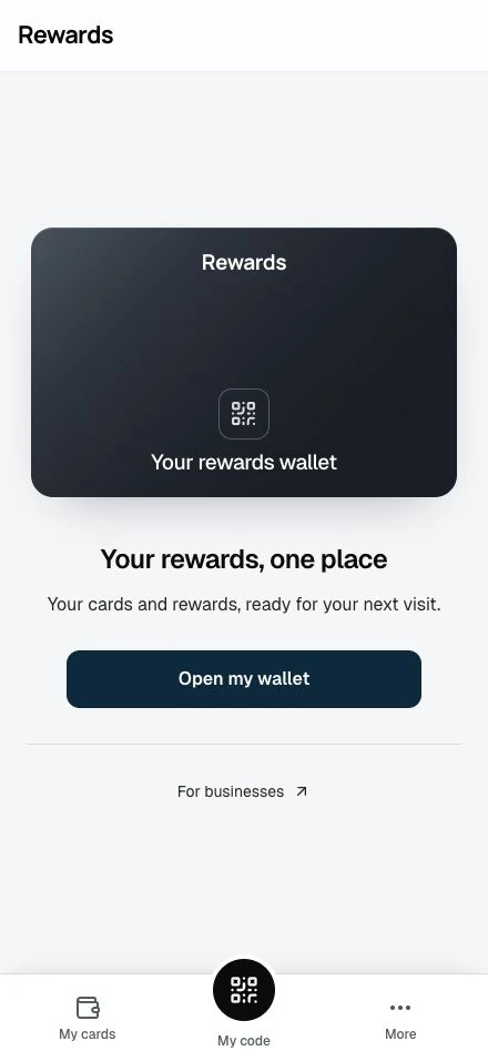 The Smart wallet homepage with the hero card and a full grid of loyalty cards, stamp cards, vouchers, and prepaid passes.