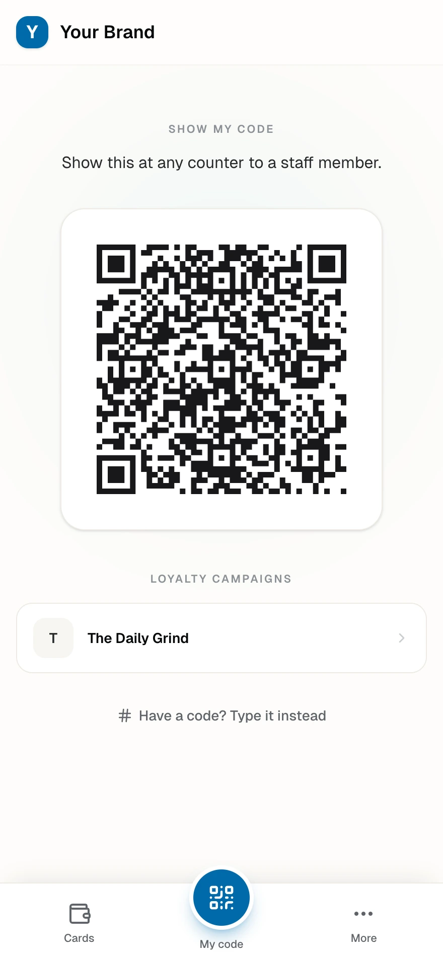The Show my code sheet with the member's wallet QR and the linked loyalty campaigns beneath it.