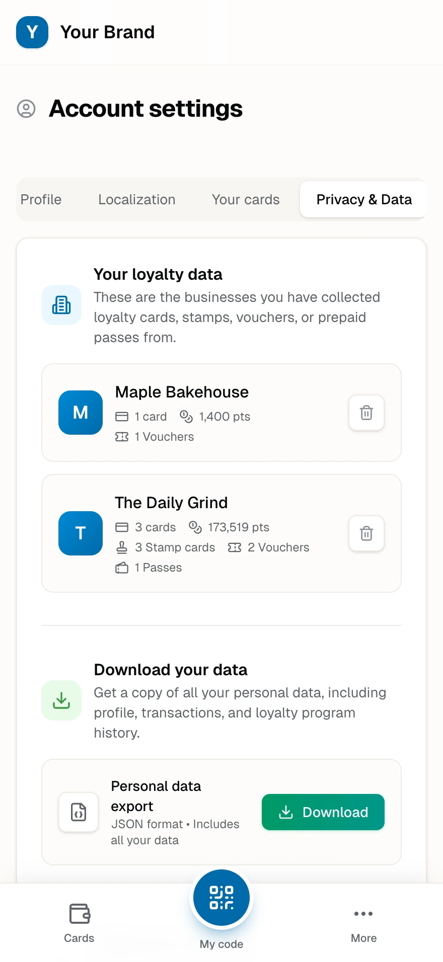 The Privacy & Data tab listing each business the member collected from, with per-business delete and the JSON data export.