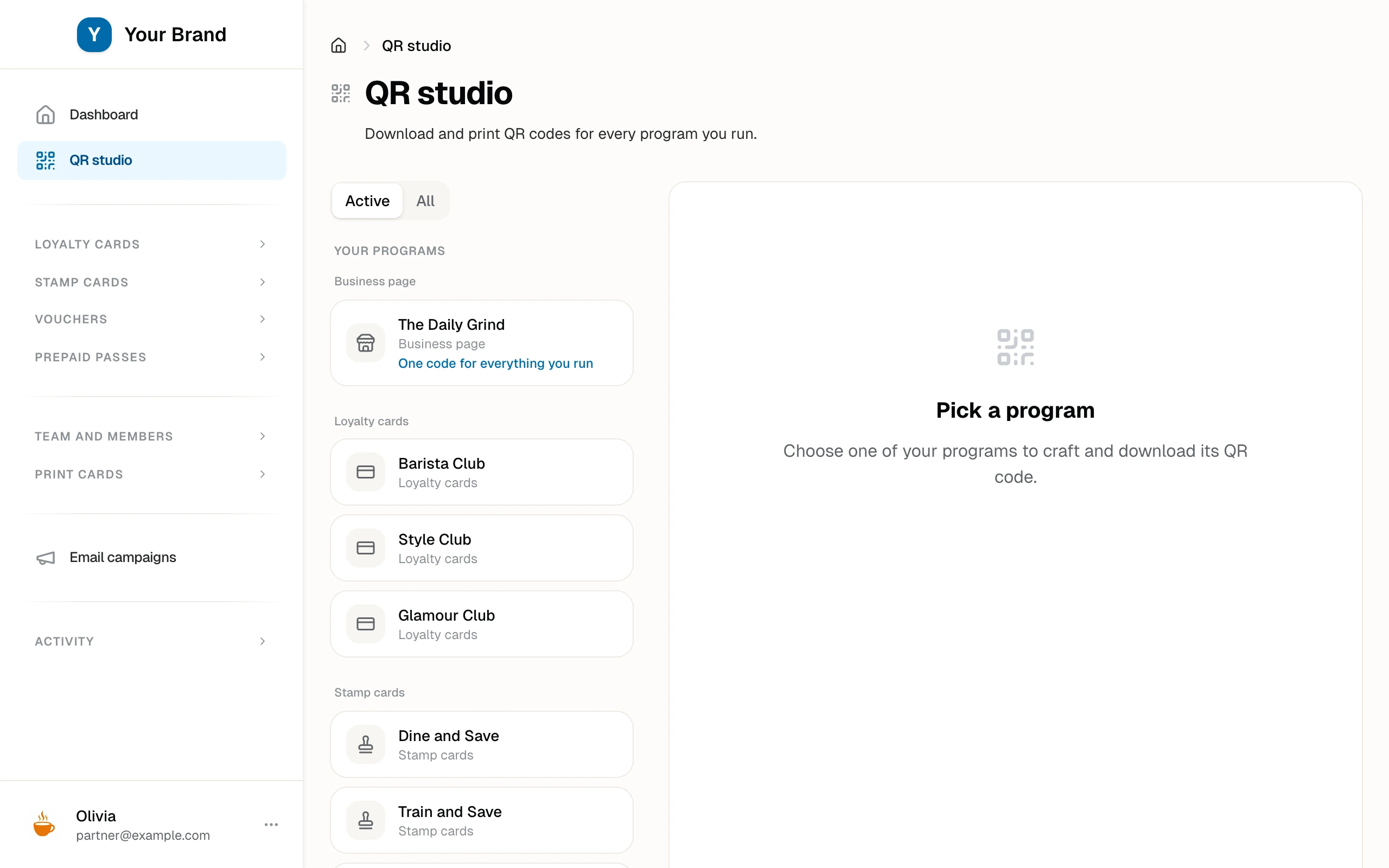 The QR studio with every program grouped by type on the left and the business page QR staged for styling and download.