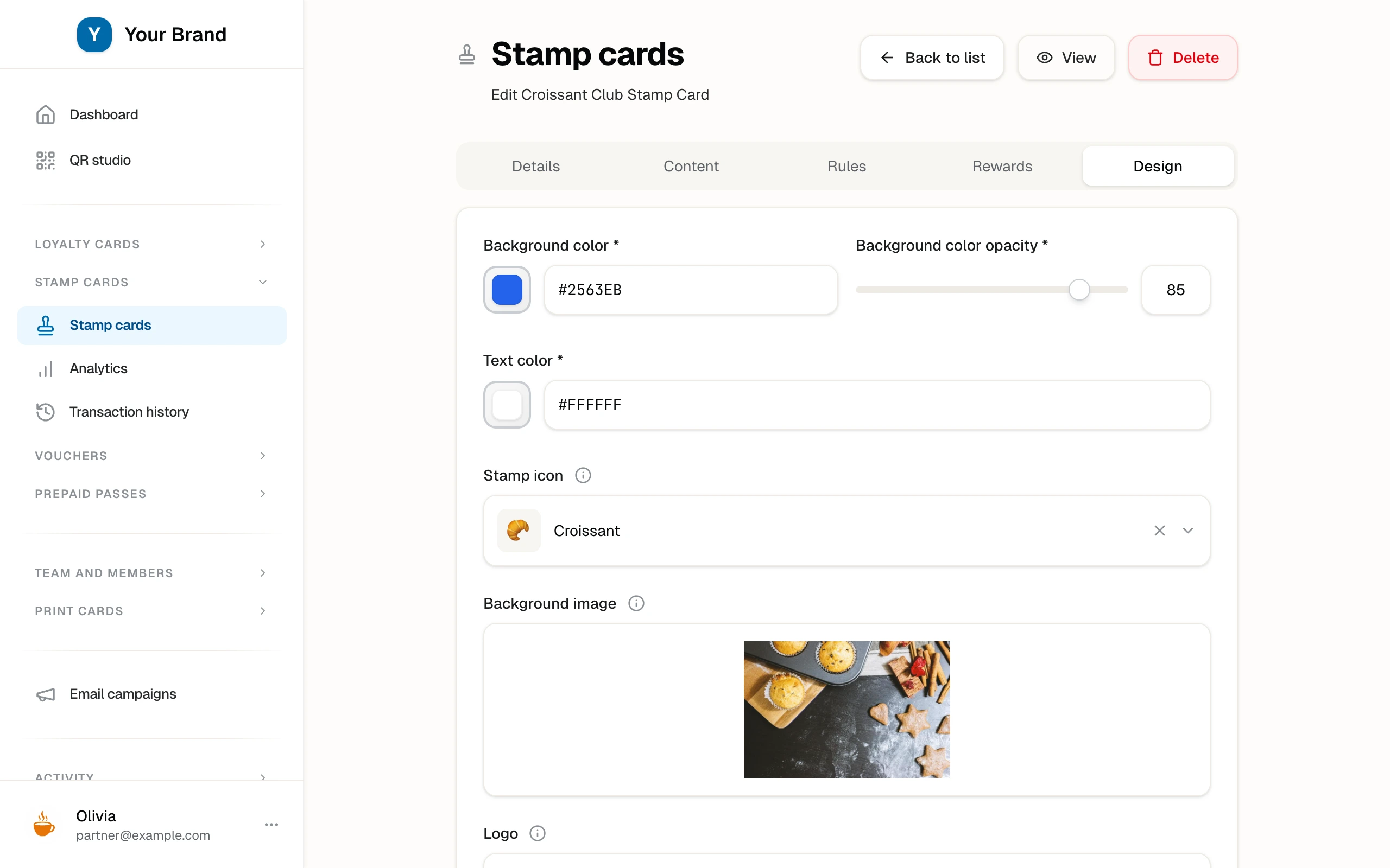 The Design tab with color pickers, the stamp icon picker, and the live preview of the finished card.