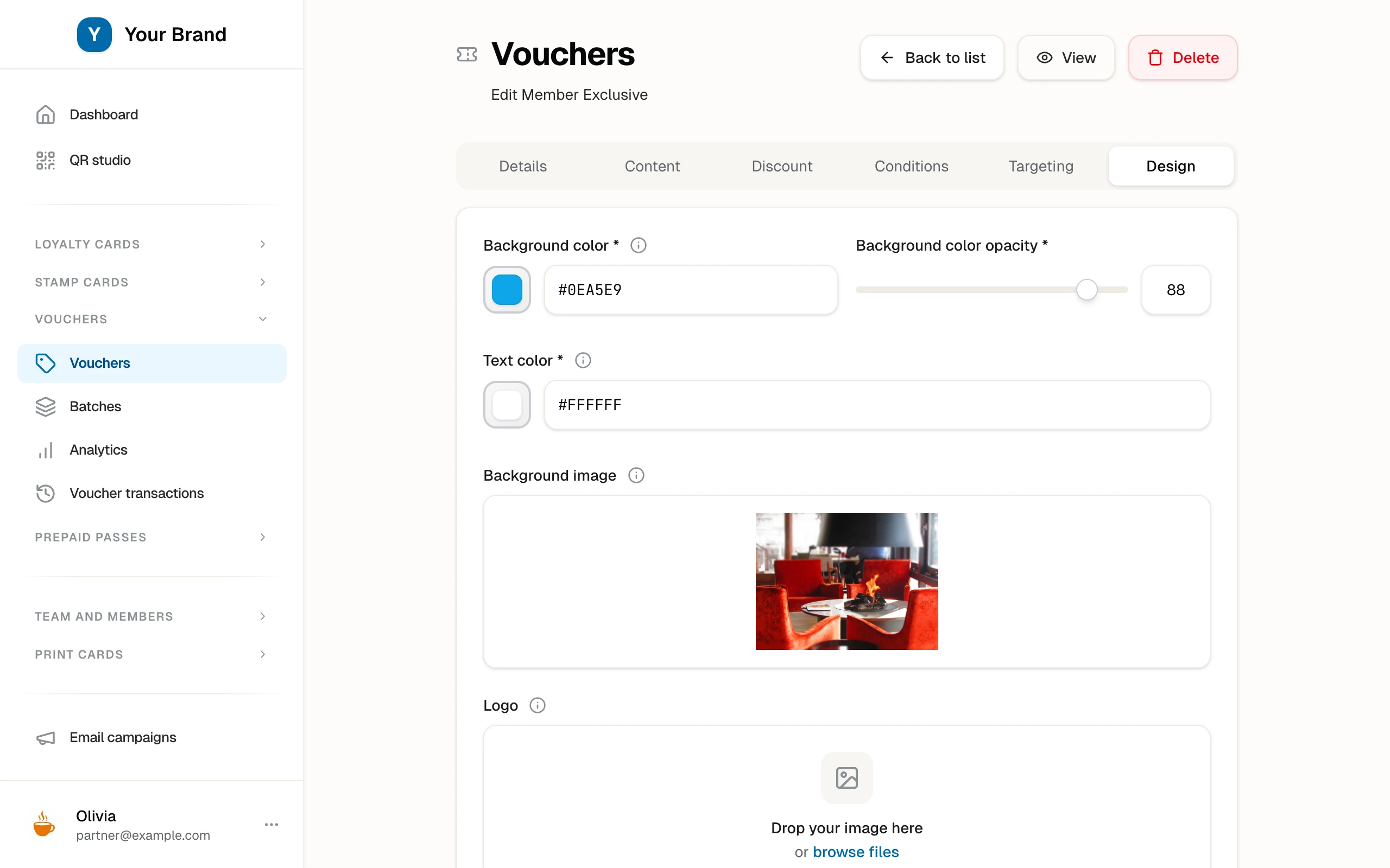 The voucher Design tab with colors, logo, background image, and the live preview of the branded voucher card.