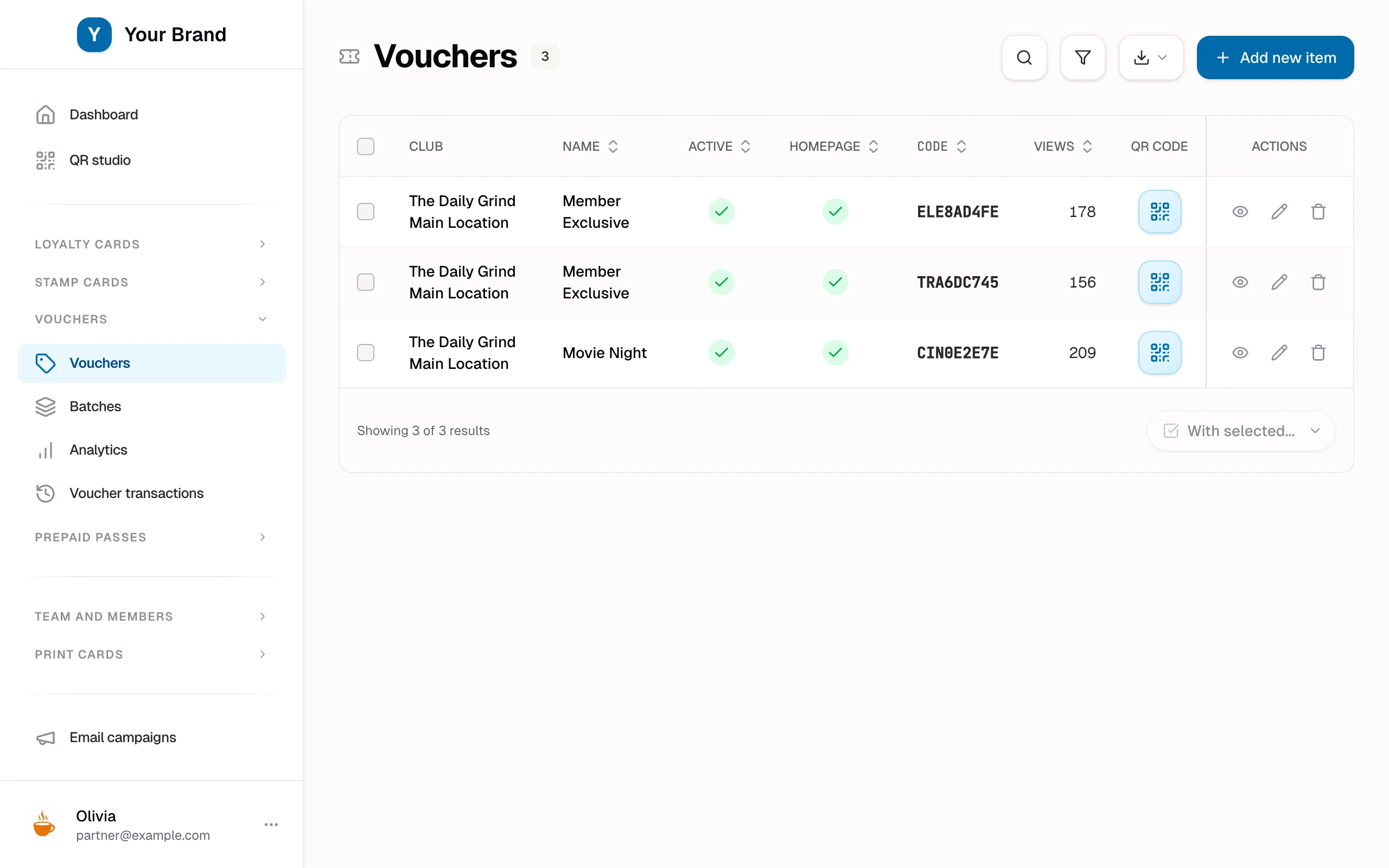 The Vouchers list with active campaigns, their codes, view counts, and per-voucher QR codes.