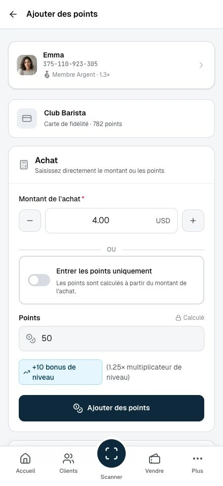 Le personnel saisit le montant de l'achat et vérifie les points avant de confirmer.