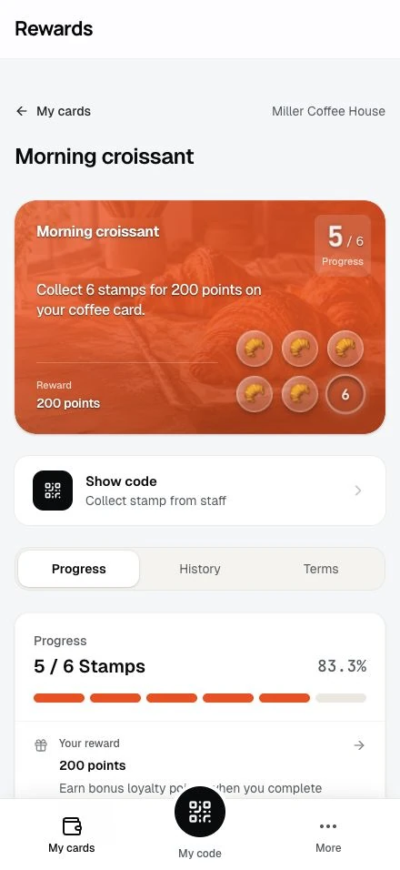 Progress on the member's card, with the transaction history behind it.