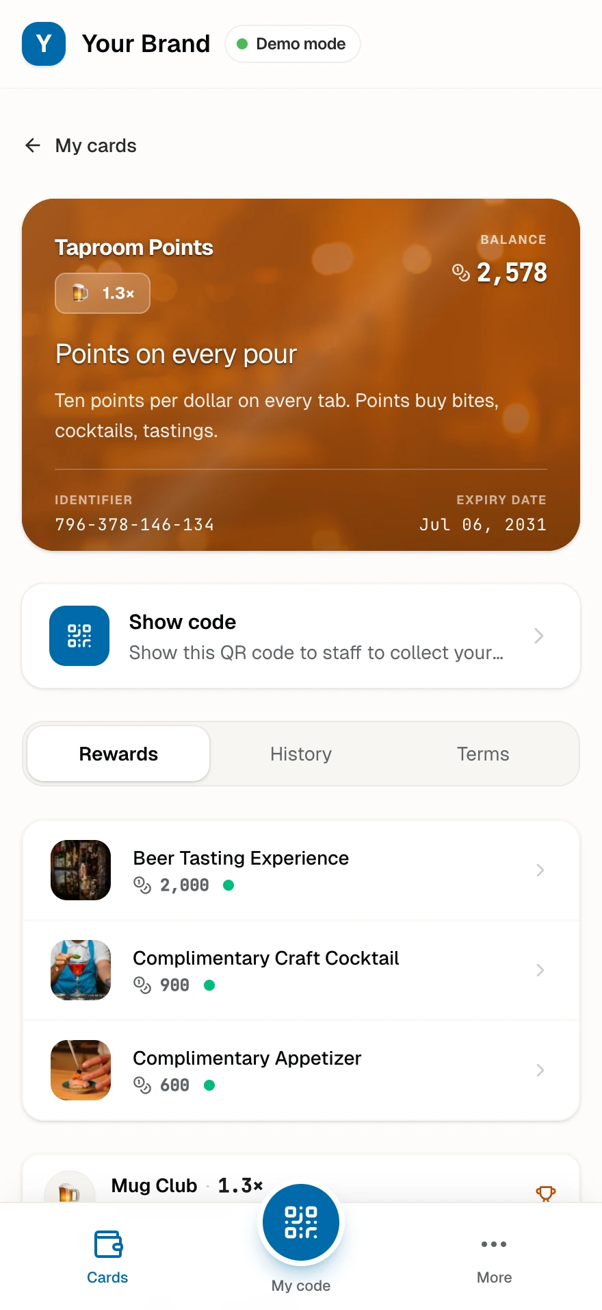 The Taproom Points card in a guest's wallet with the Mug Club badge