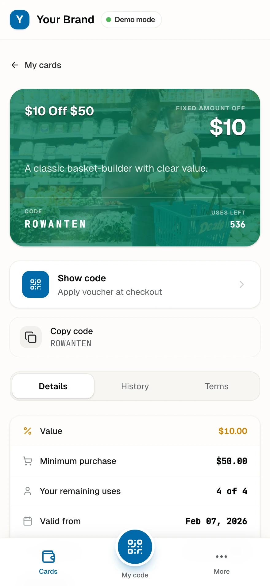 The ten-dollars-off voucher with its fifty-dollar minimum in a shopper's wallet