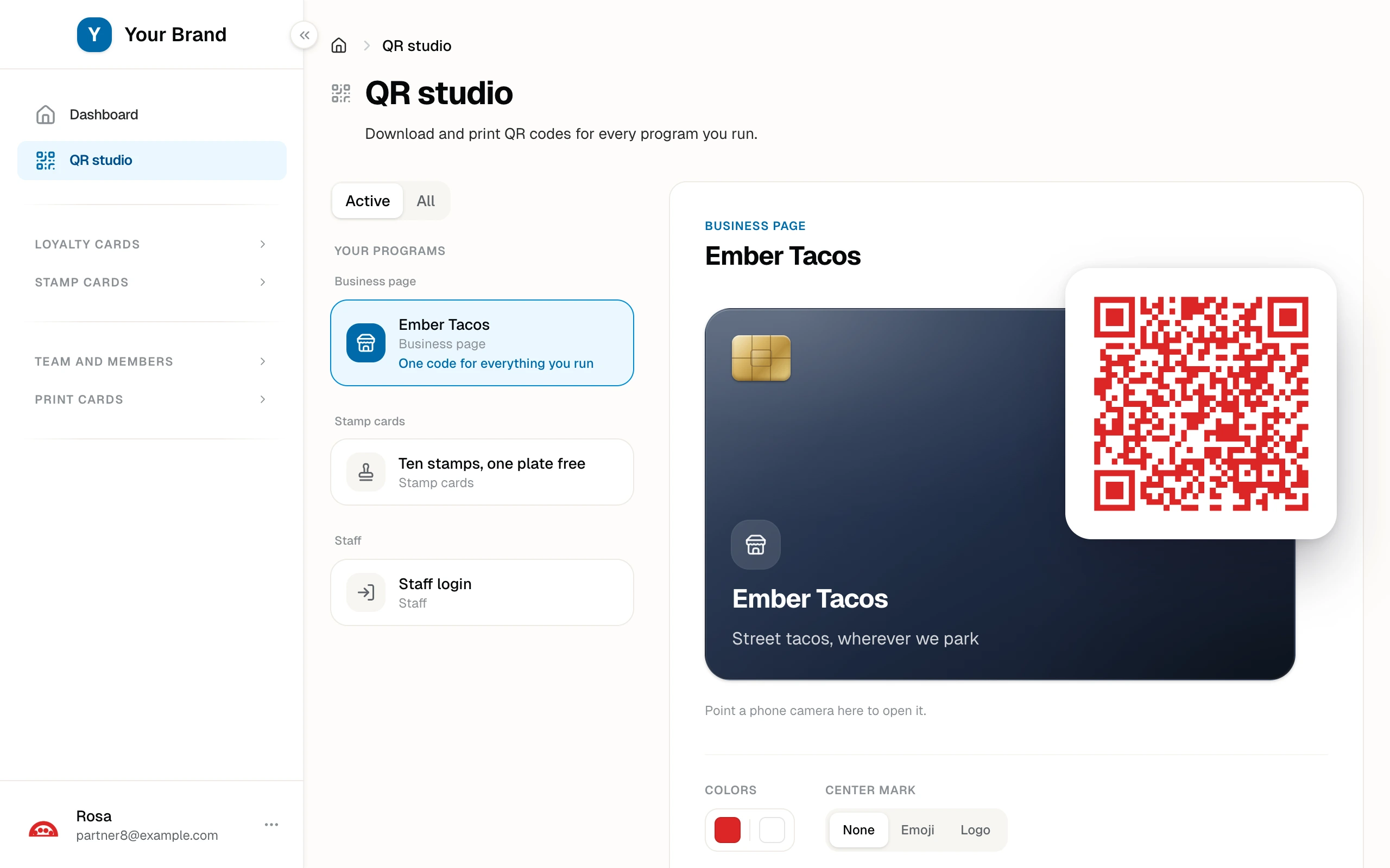 The QR studio with the truck's window code in brand red